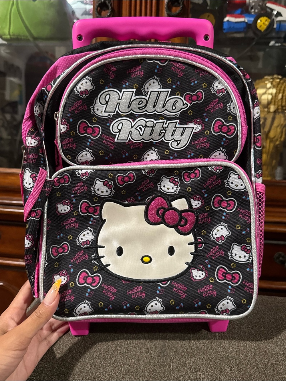Hello Kitty Black and Pink Rolling Luggage